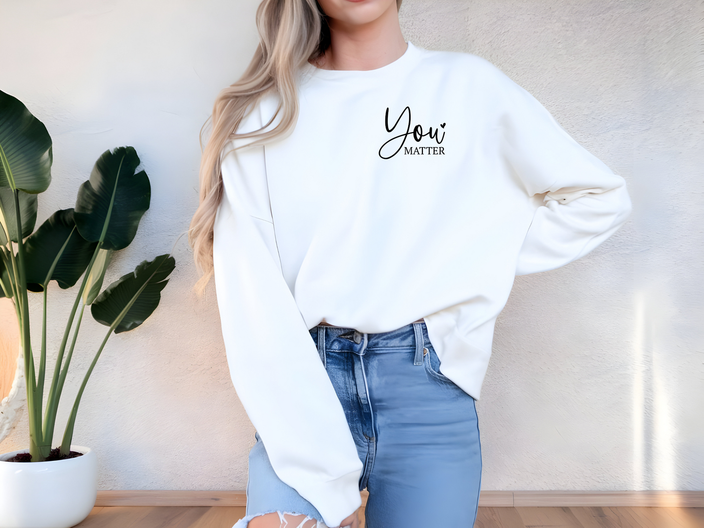 Positiver Pullover mit "You Matter" auf der Brust und inspirierendem Spruch am Rücken. Verbreite gute Vibes und bleib cozy dabei!